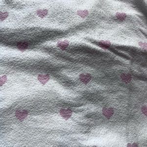 Pottery Barn Kids flannel crib sheet white with pink hearts